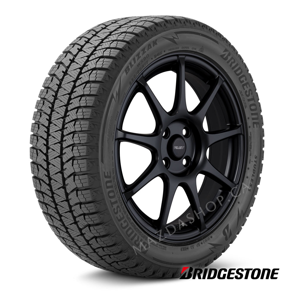 Bridgestone tire with black rim on a white background