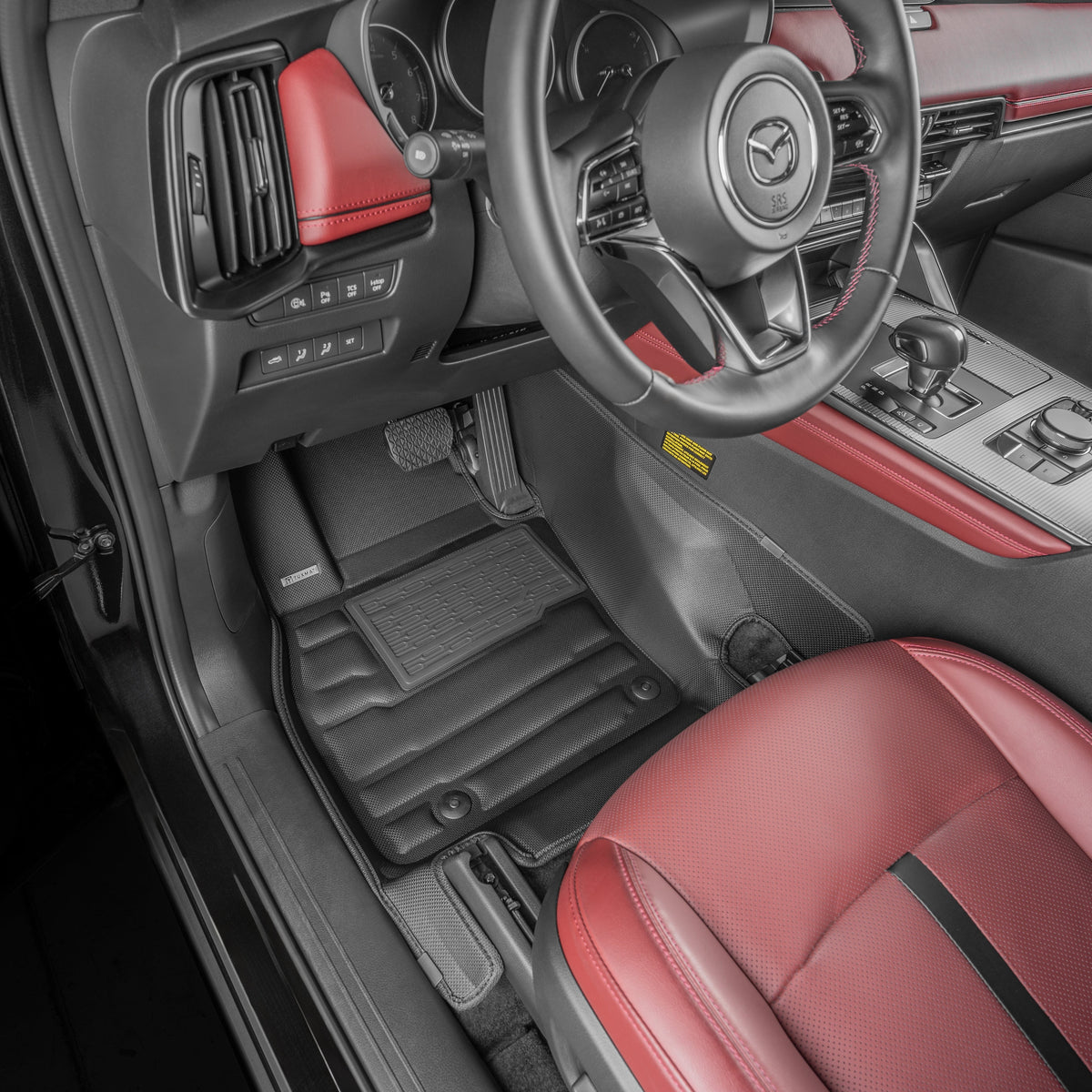 Car interior with red and black seats and dashboard