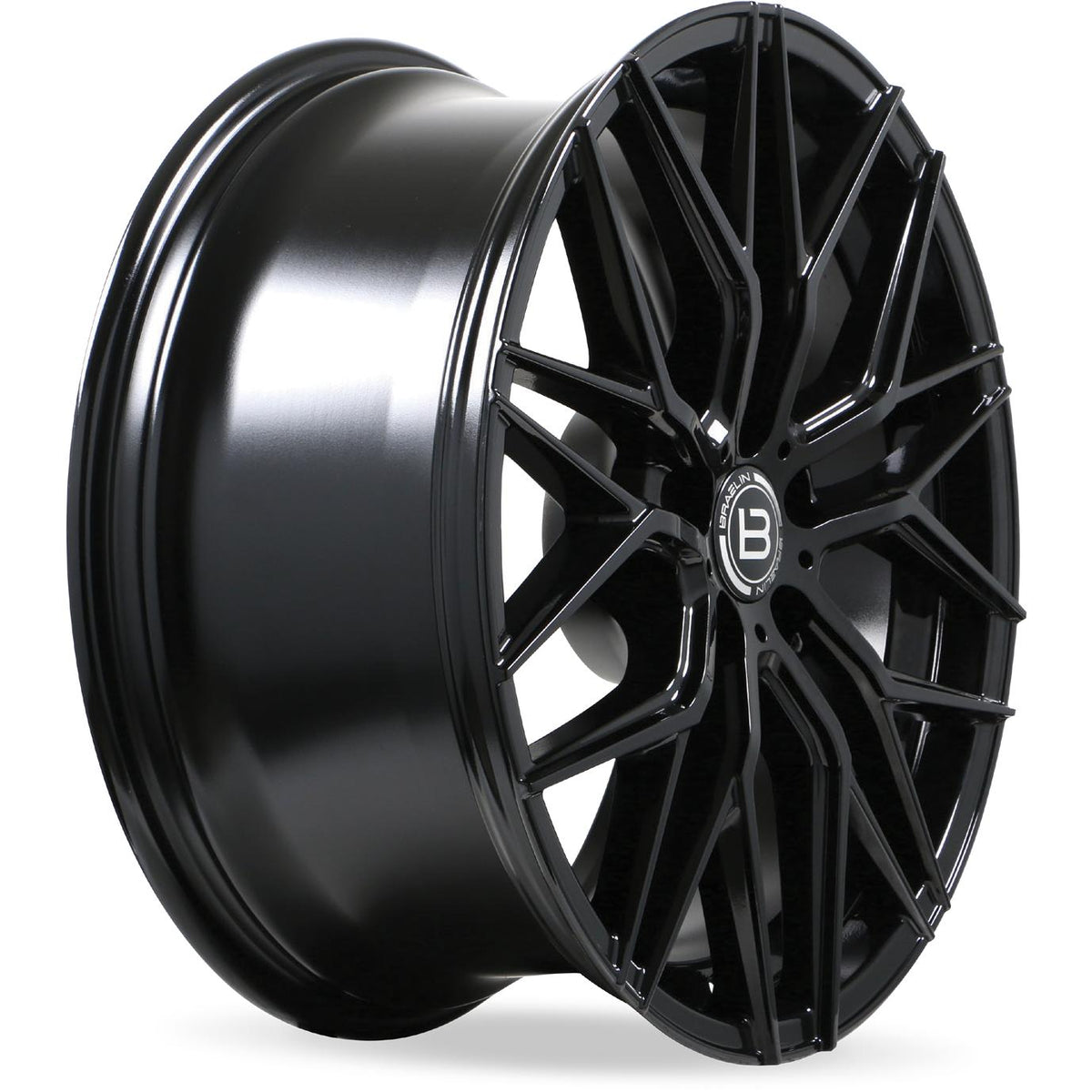 Black alloy wheel with a brand logo on a white background