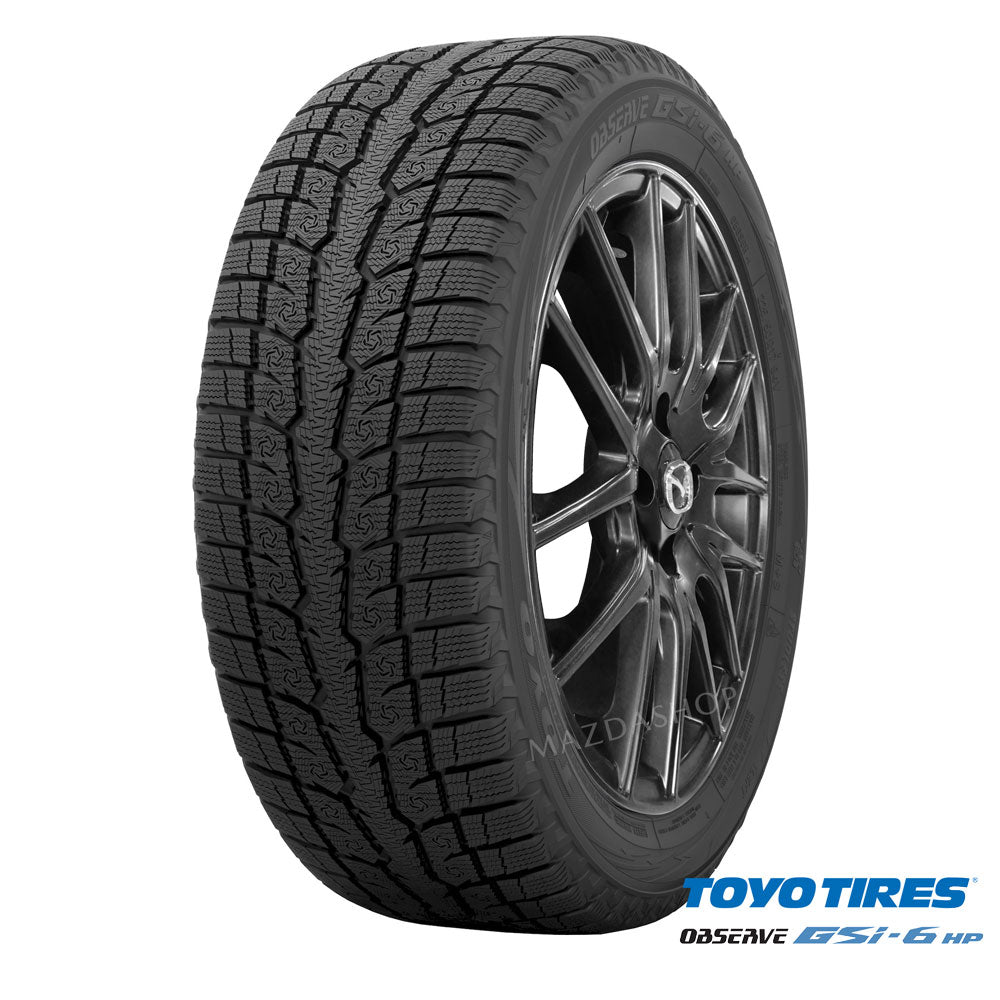 Car tire with tread pattern on a white background, featuring Toyo Tires branding.