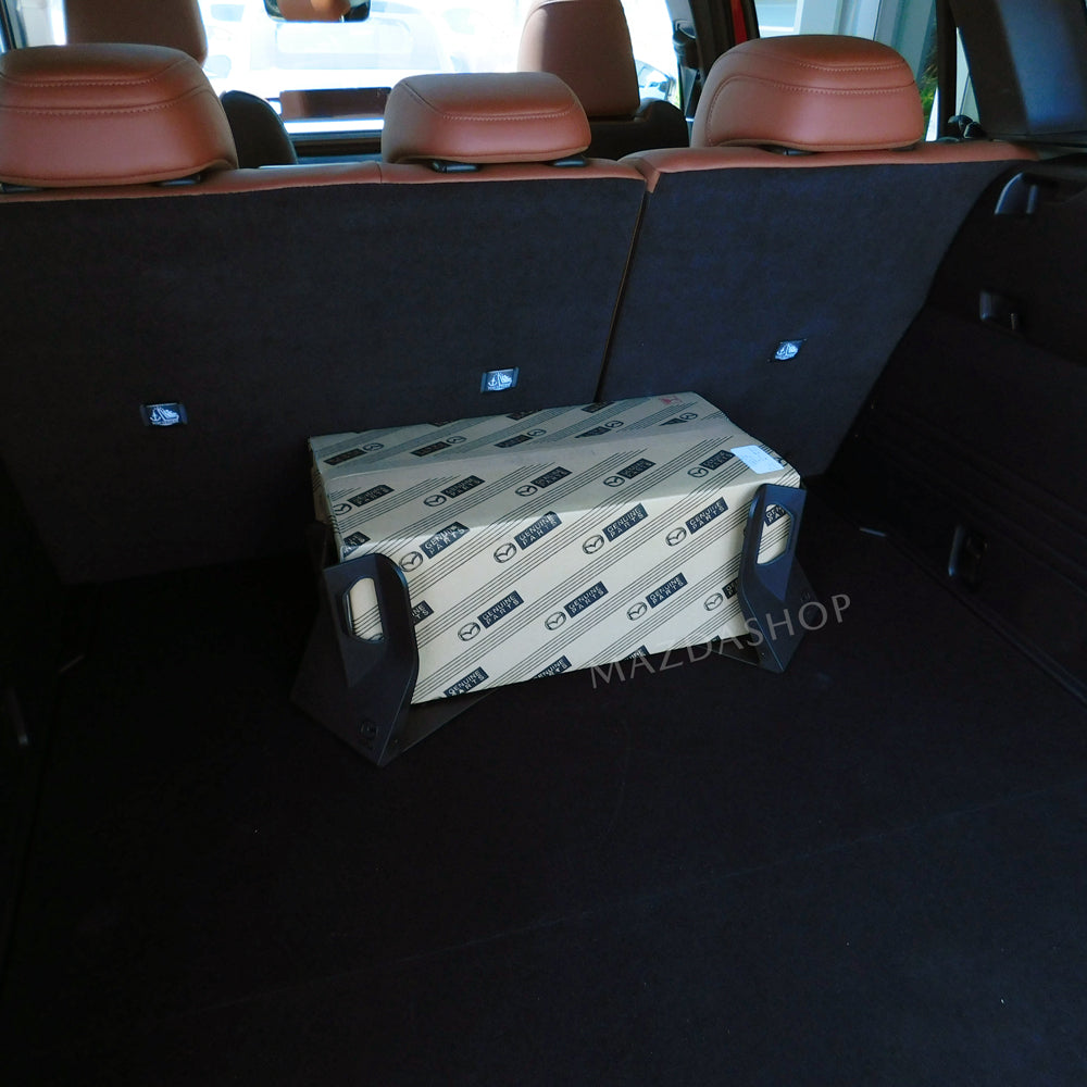 Cargo Blocks holding package in trunk